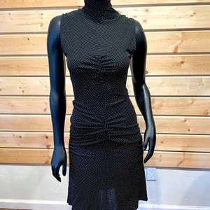 Moschino sleeveless, mock neck, ruched mini dress.  Black with white polkadots.
